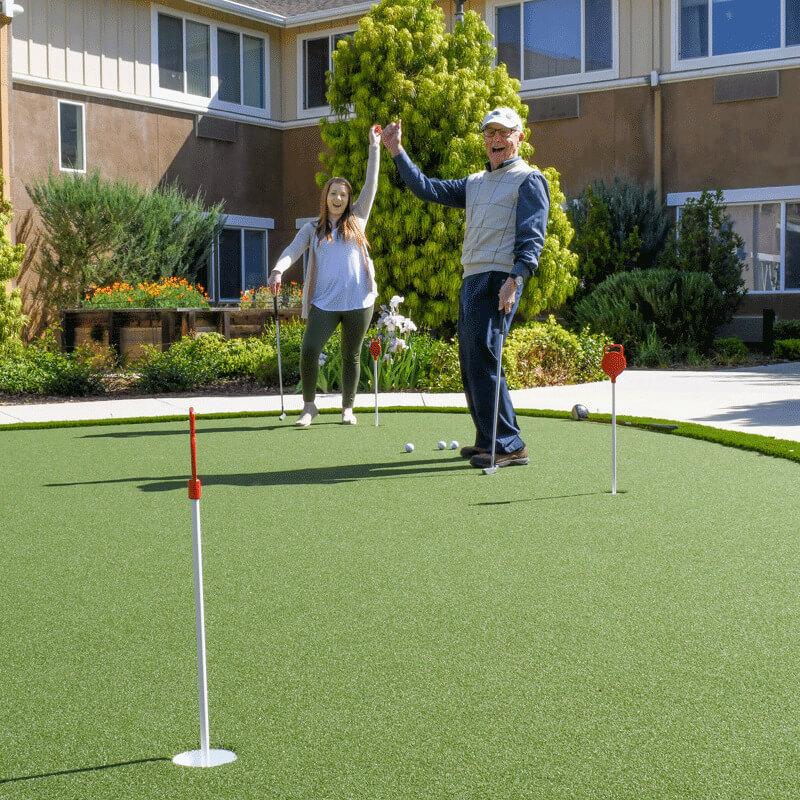 Fun on the putting green at Elk Grove Community